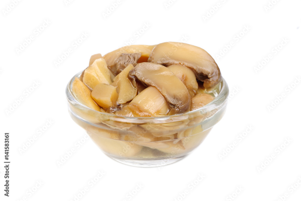 pickled mushrooms in glass bowl isolated on white pickled mushrooms in glass bowl isolated on white