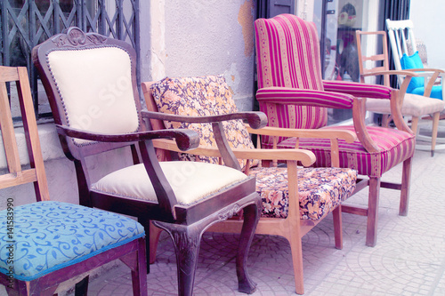 Antique soft armchairs in different colors
