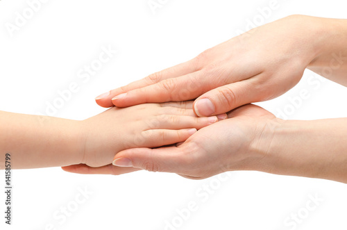 hand of young girl holding kids hand.
