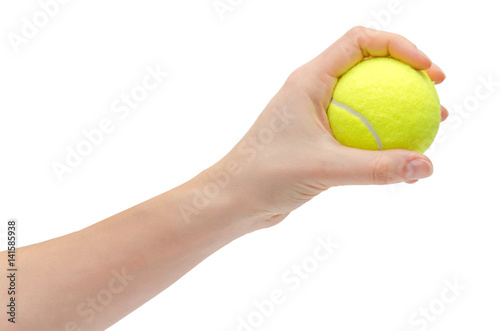 hand of young girl holding tennis ball. © Sviatoslav Kovtun