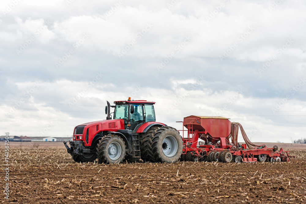 Farmer tractor working in the field. Spring time for sowing. Planting crops. Farmer tractor working in the field. Spring time for sowing. Planting crops.