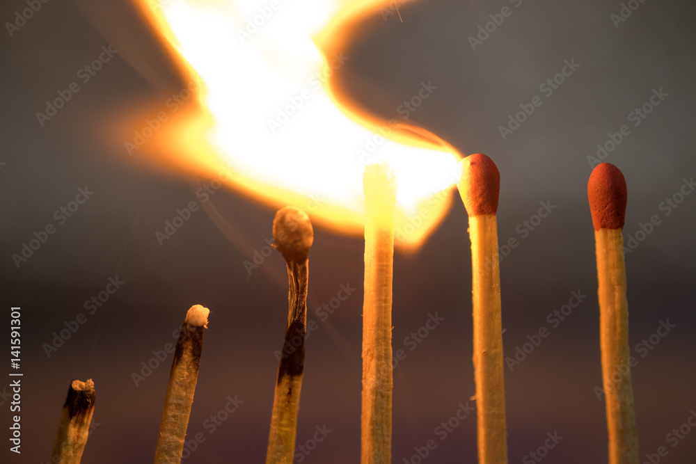 Row of matches starts buring, Row of matches starts buring,