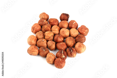 peeled hazelnuts isolated on white background