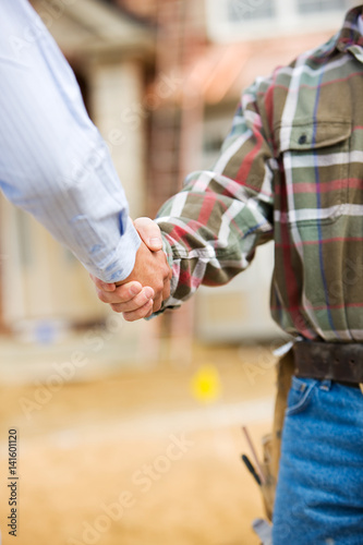 Construction: Agent and Contractor Shake Hands © seanlockephotography