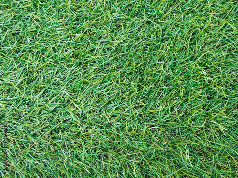 Background texture with fake grass top view. Background texture with fake grass top view.