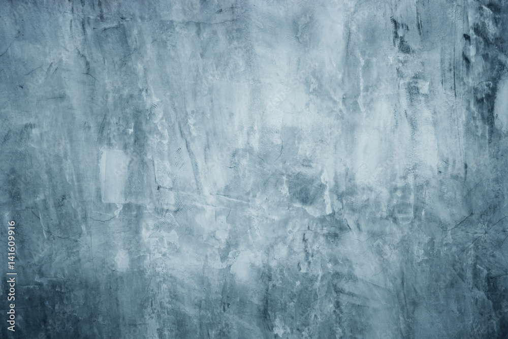 Grunge blue wall background or texture.