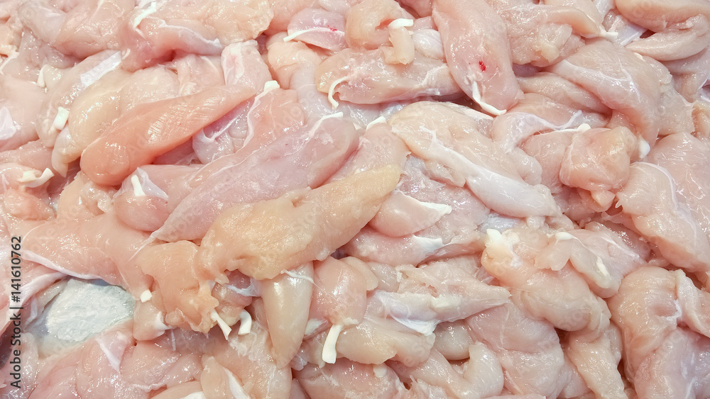 Pieces of chicken meat. Raw chicken meat in the market. Pieces of chicken meat. Raw chicken meat in the market.