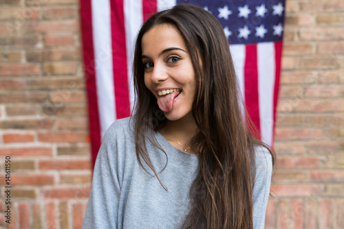 Woman with tongue out photo