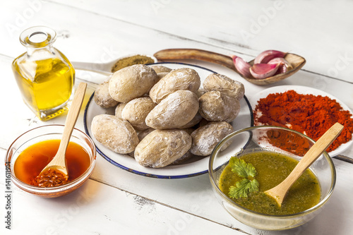 Canarian potatoes ,papas arrugadas with mojo, hot sauce. Spanish food