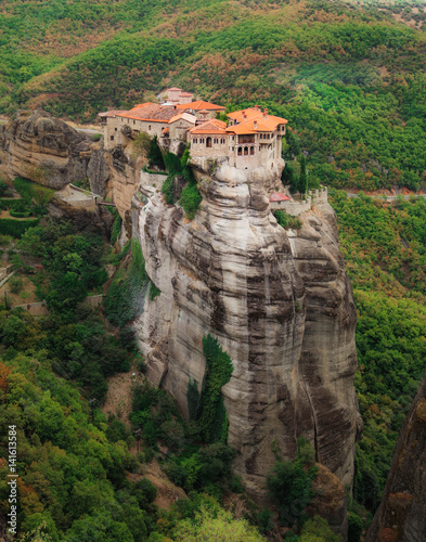Panoramic view of Meteora monastery on the high rock in the mountains at summer time, Greece