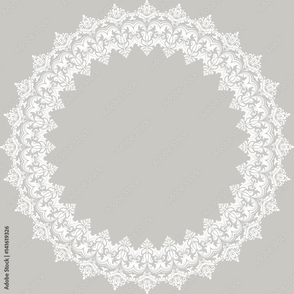 Oriental round white frame with arabesques and floral elements. Floral fine border. Greeting card with place for text Oriental round white frame with arabesques and floral elements. Floral fine border. Greeting card with place for text