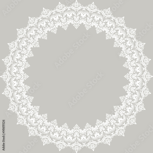 Oriental round white frame with arabesques and floral elements. Floral fine border. Greeting card with place for text