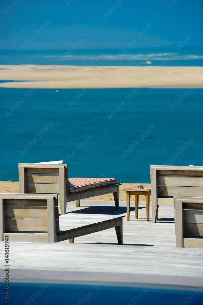 Beautiful tropical beach with chairs and swimingroom