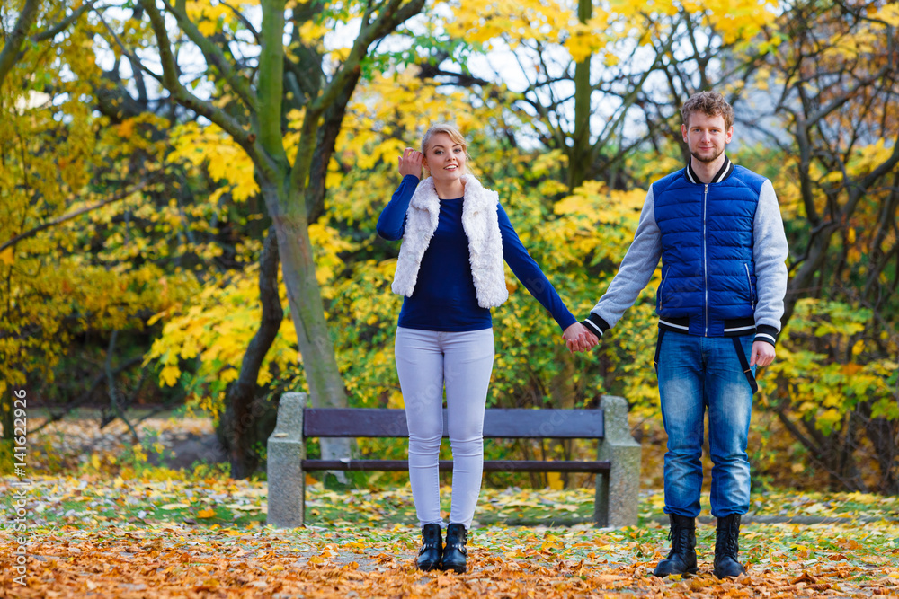 Couple in love enjoy romantic date in park. Couple in love enjoy romantic date in park.