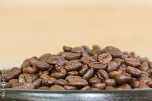 Coffee beans in wood tray