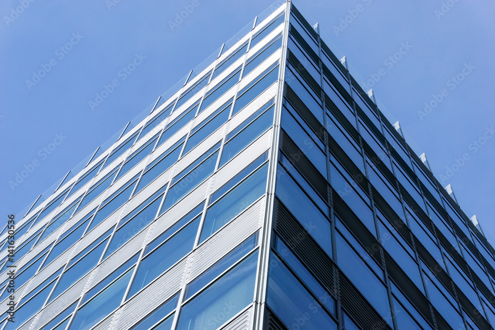 View of a modern glass skyscraper buildings around View of a modern glass skyscraper buildings around