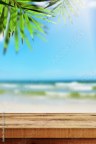 Beautiful beach background and wooden table.