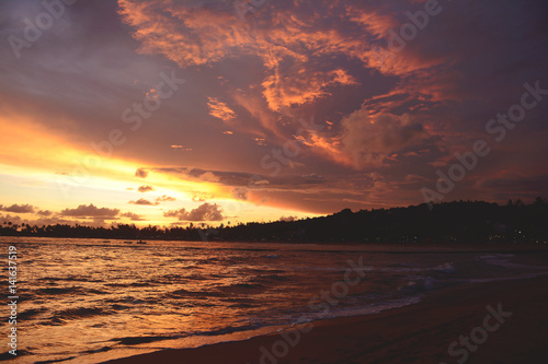 Amazing colorful sunset in Unawatuna tropical beach  Sri Lanka