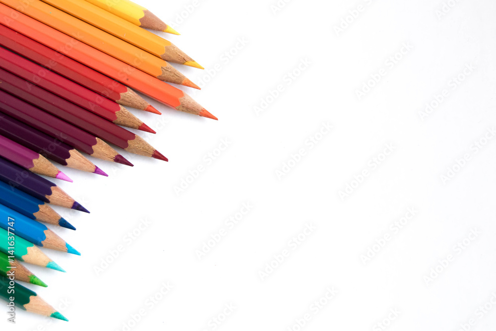 Colored pencils on a white background. Pencils rainbow. Place for your text on he right. Colored pencils on a white background. Pencils rainbow. Place for your text on he right.