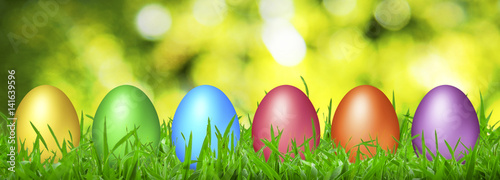 The color Easter eggs hidden in a grass.