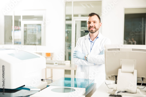 Male chemist working in a modern lab