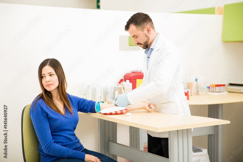 Nervous patient getting blood drawn Nervous patient getting blood drawn