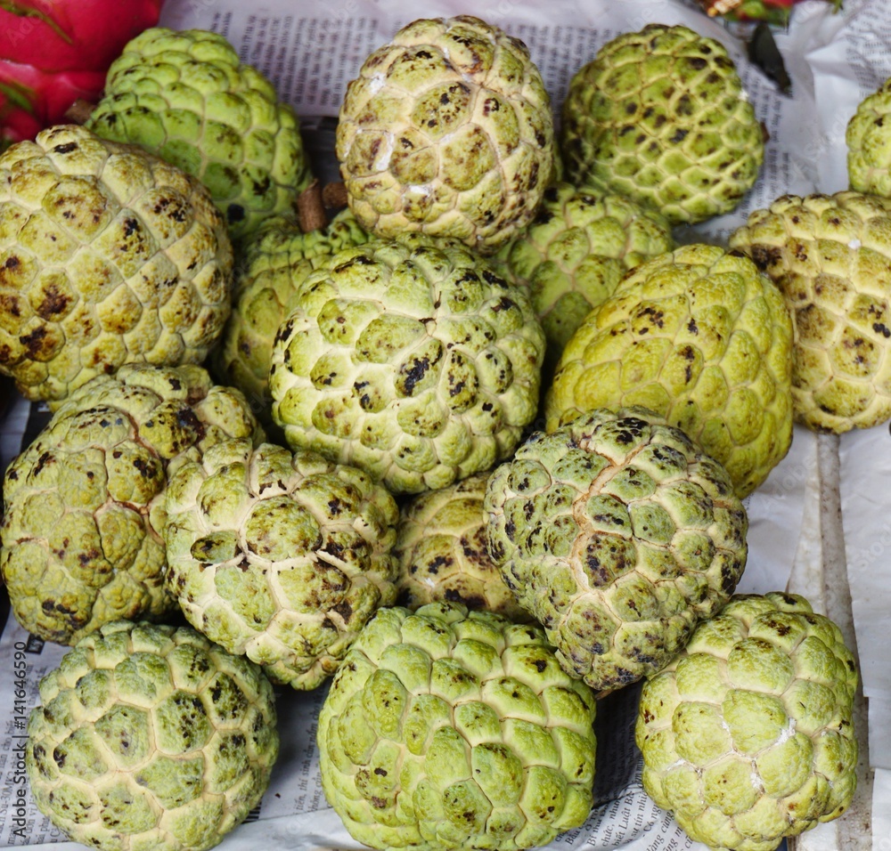Annona fruit in bulk at a market in Vietnam Annona fruit in bulk at a market in Vietnam