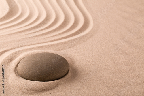 zen meditation stone and sand garden. Concept background for harmony spirituality and spirituality. Yoga or spa wellness background..