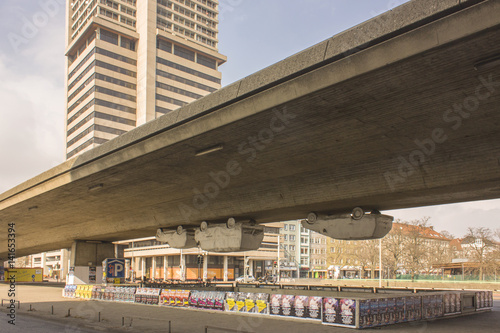 Atypical parking on urban bridge. Cars under the bridge
