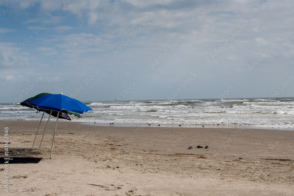 Umbrella on the beach in Port Aransas, Texas Umbrella on the beach in Port Aransas, Texas