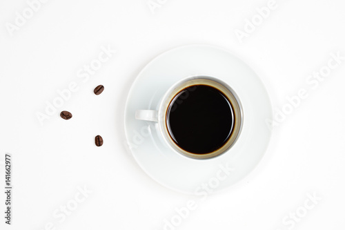 White Coffee Cup and Coffee Beans 