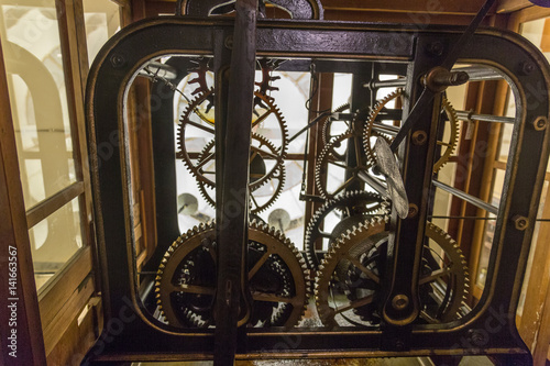 Huge driving mechanism of the city clock in the town hall