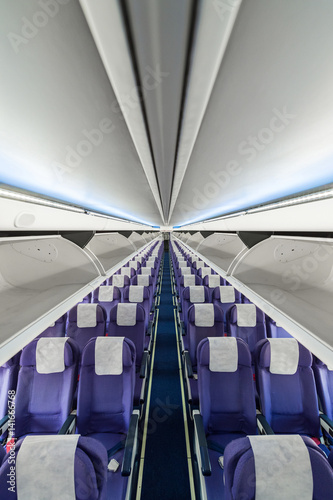 Empty passenger airplane seats in the cabin © sattapapan tratong
