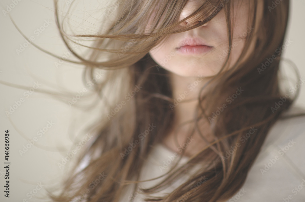 Midsection of girl with tousled hair at home Midsection of girl with tousled hair at home