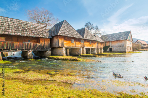 Beautiful countryside landscape in Lika, water mills, Majerovo vrilo, Croatia photo