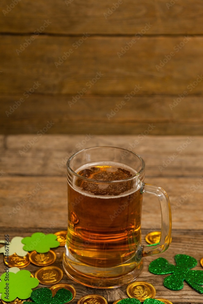 Mug of beer, chocolate gold coins and shamrock Mug of beer, chocolate gold coins and shamrock