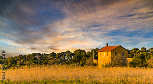 Foto Orange farmhouse in Sardinian countryside