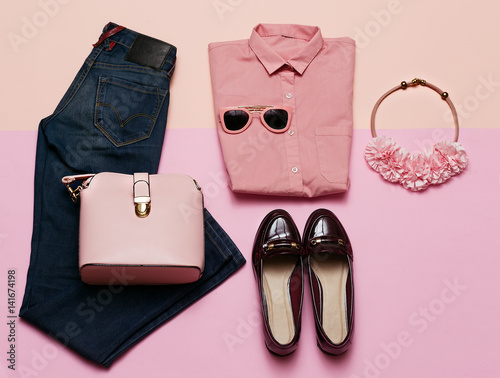 Romantic clothes set. City casual fashion. Spring. Stylish accessories. Pink shirt. Jeans. Bag. Bijouterie for Lady