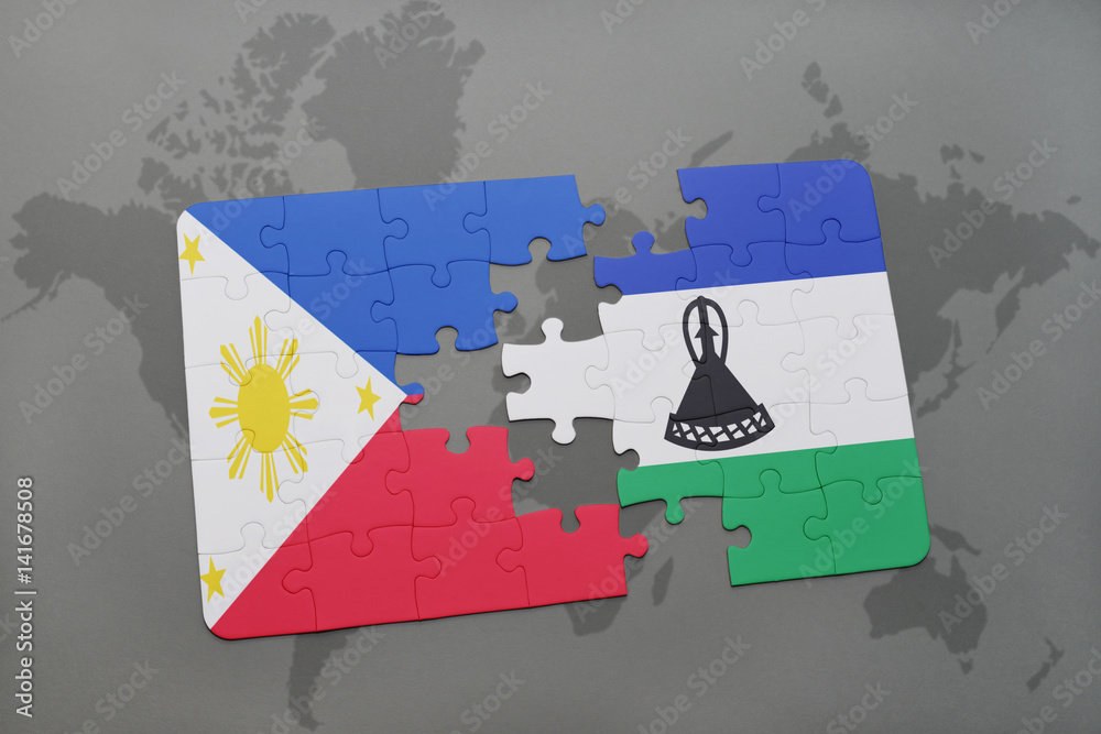 puzzle with the national flag of philippines and lesotho on a world map ...