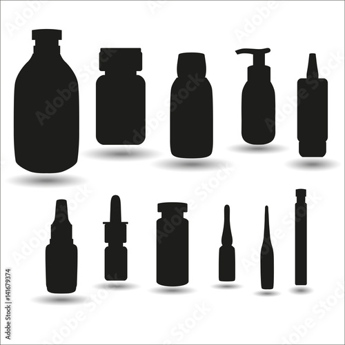 Ampoules and bottles on white background