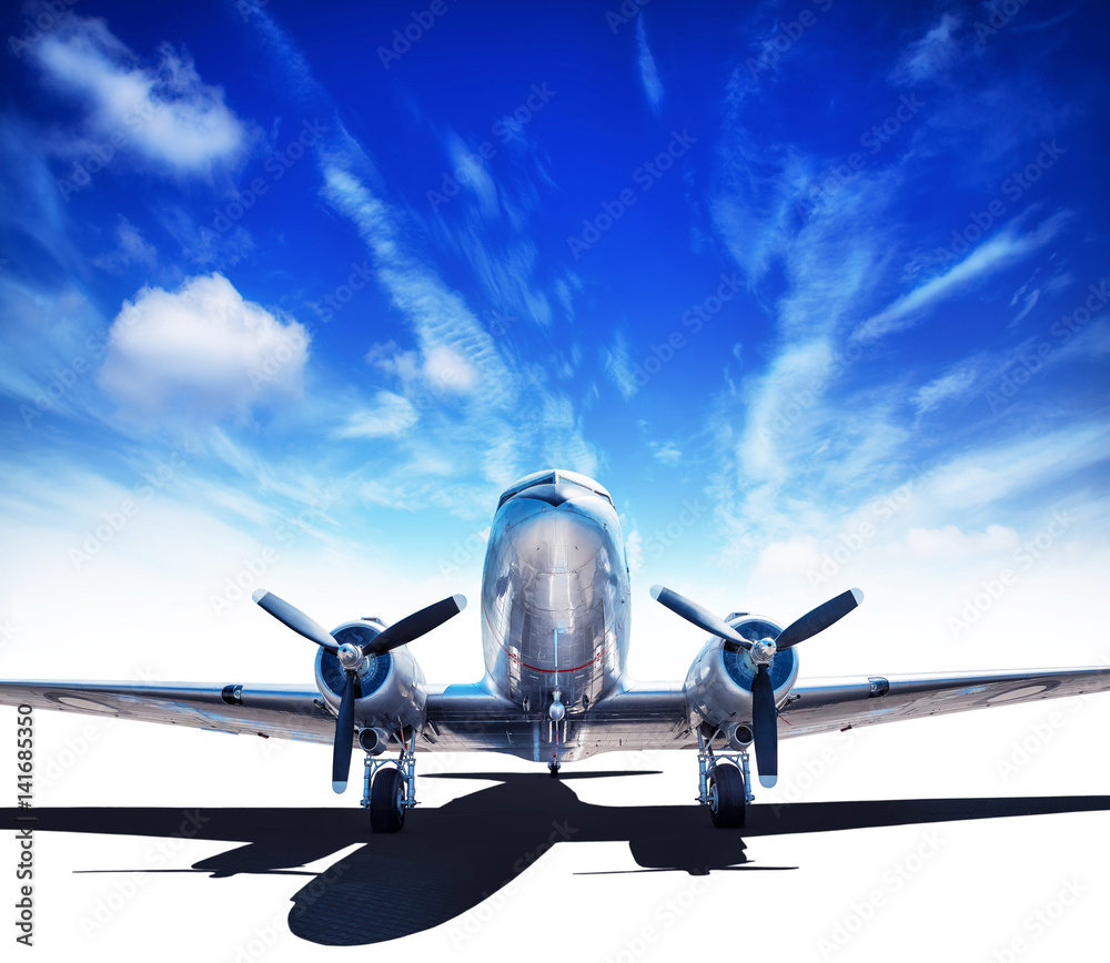 Fototapeta premium vintage aircraft against a blue sky