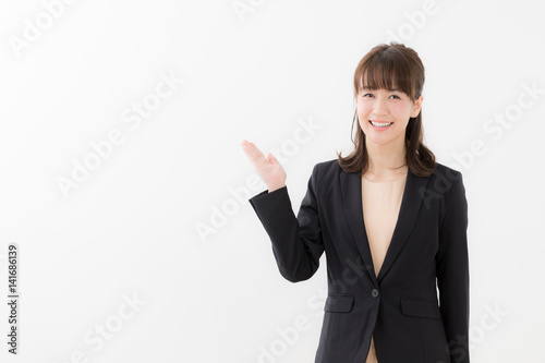 Foto portrait of asian businesswoman isolated on white background
