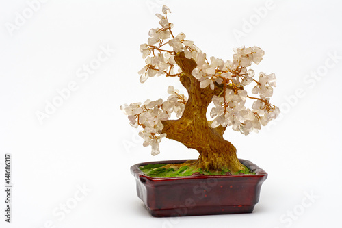 Happiness tree in a brown pot on a white background