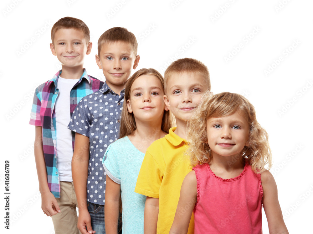 Cute children standing in a row on white background Cute children standing in a row on white background