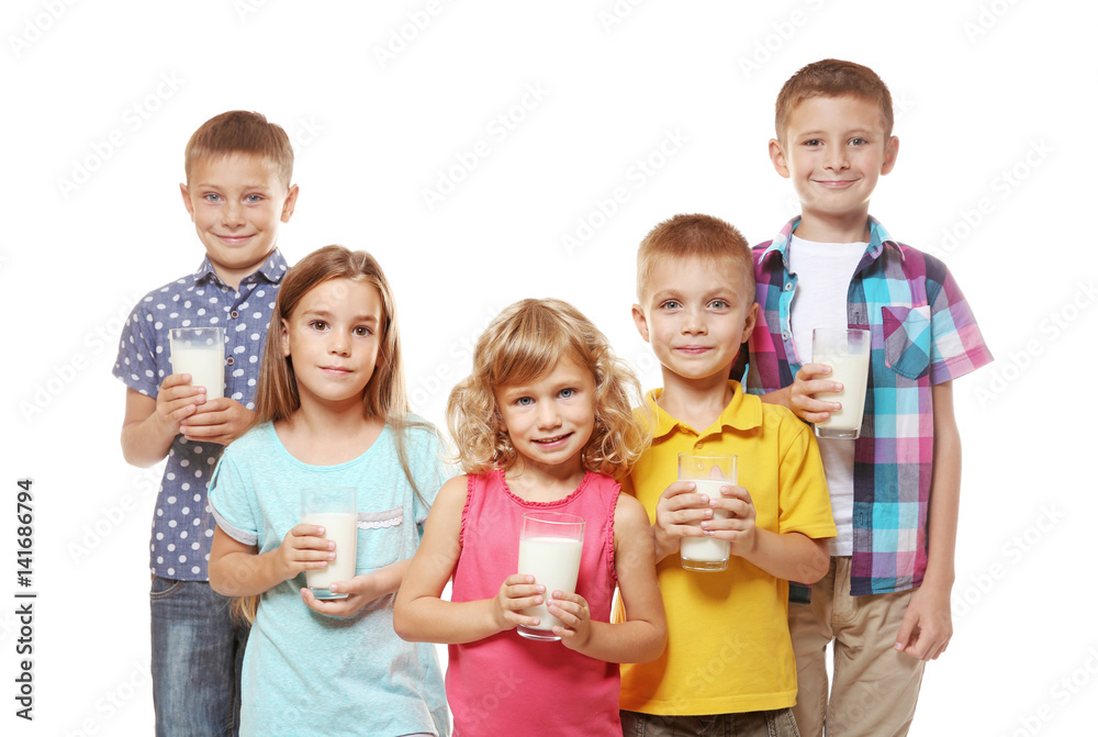 Children with glasses of milk on white background Children with glasses of milk on white background
