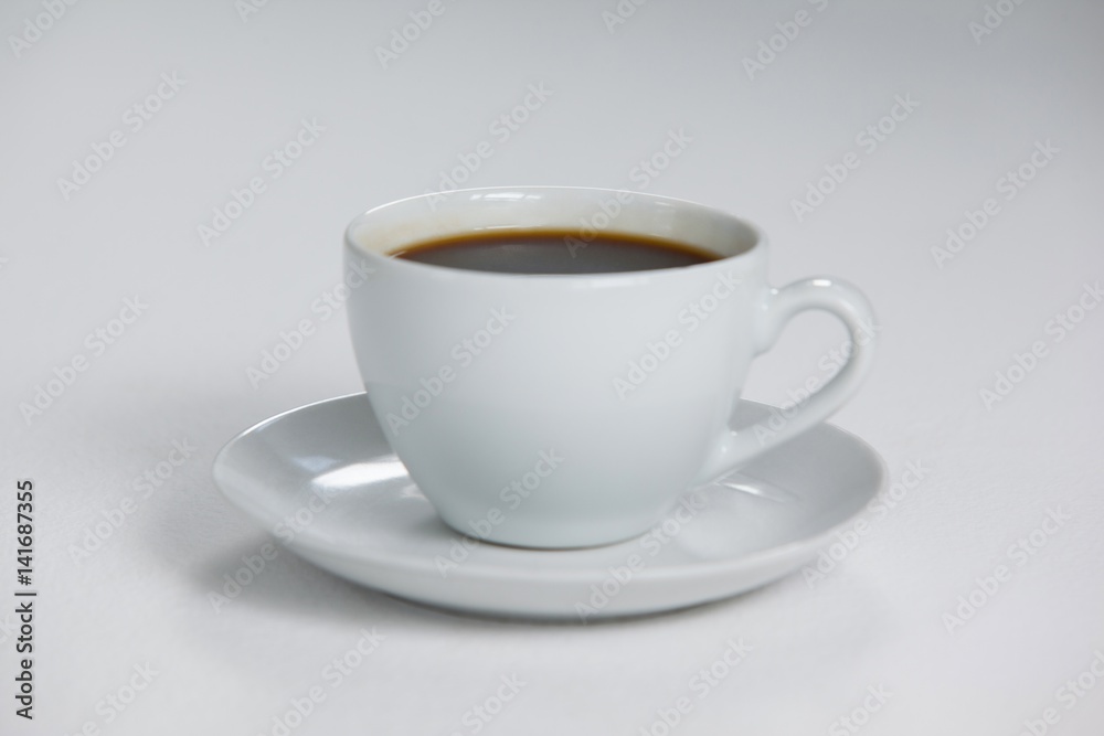 Black coffee served in white cup Black coffee served in white cup