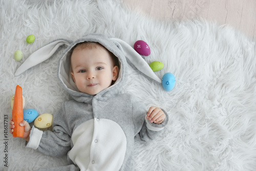 Cute little baby in bunny c...