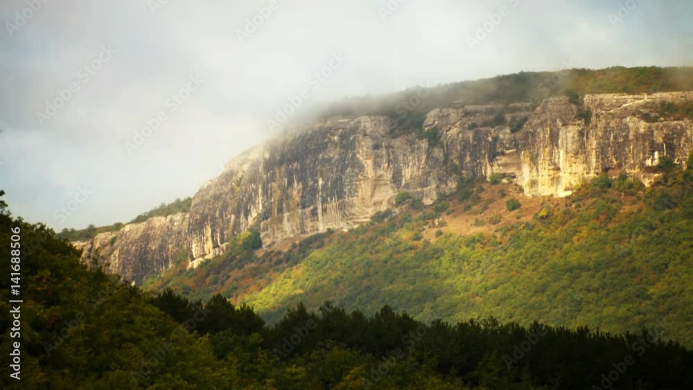 Crimean Mesa (table) mountains running clouds time-lapse footage near the Bakhchysarai, Ukraine Crimean Mesa (table) mountains running clouds time-lapse footage near the Bakhchysarai, Ukraine