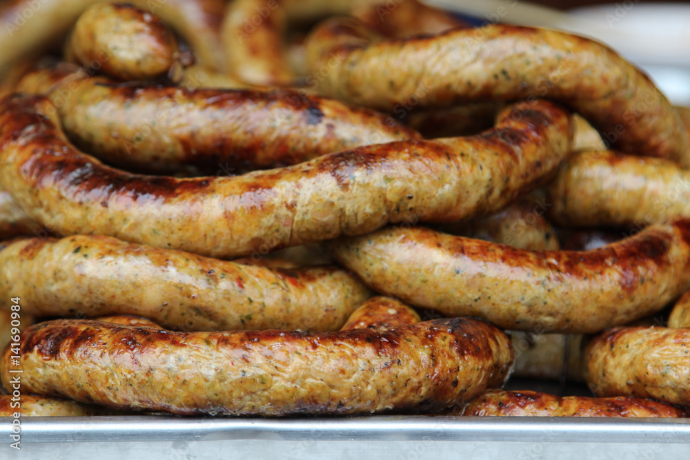 Thai food, grilled Thai sausages Northern style on stove at market. Thai food, grilled Thai sausages Northern style on stove at market.