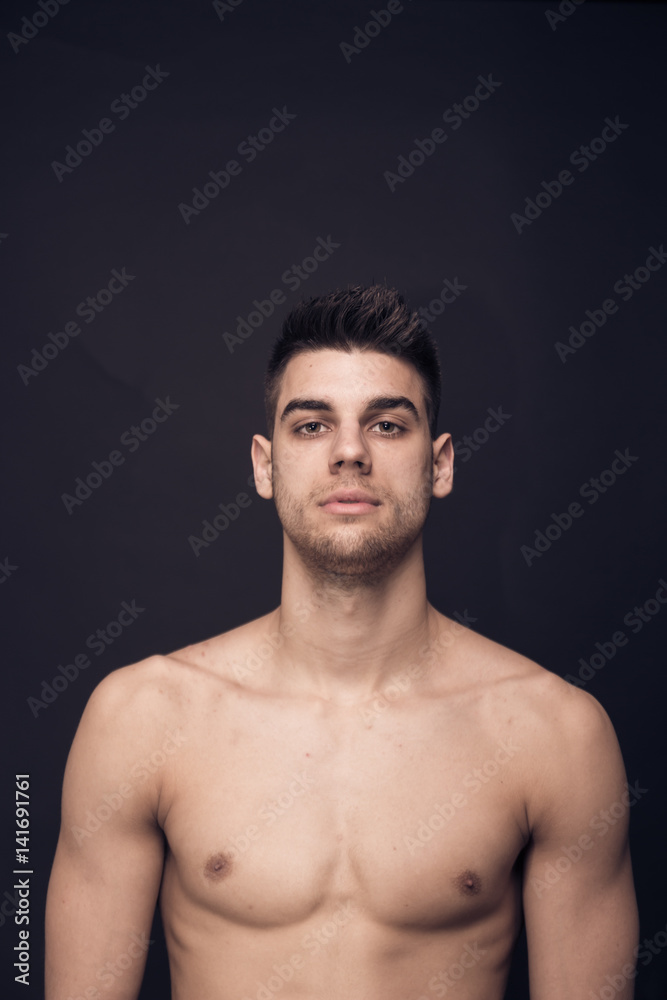 one young man confident upper body shirtless